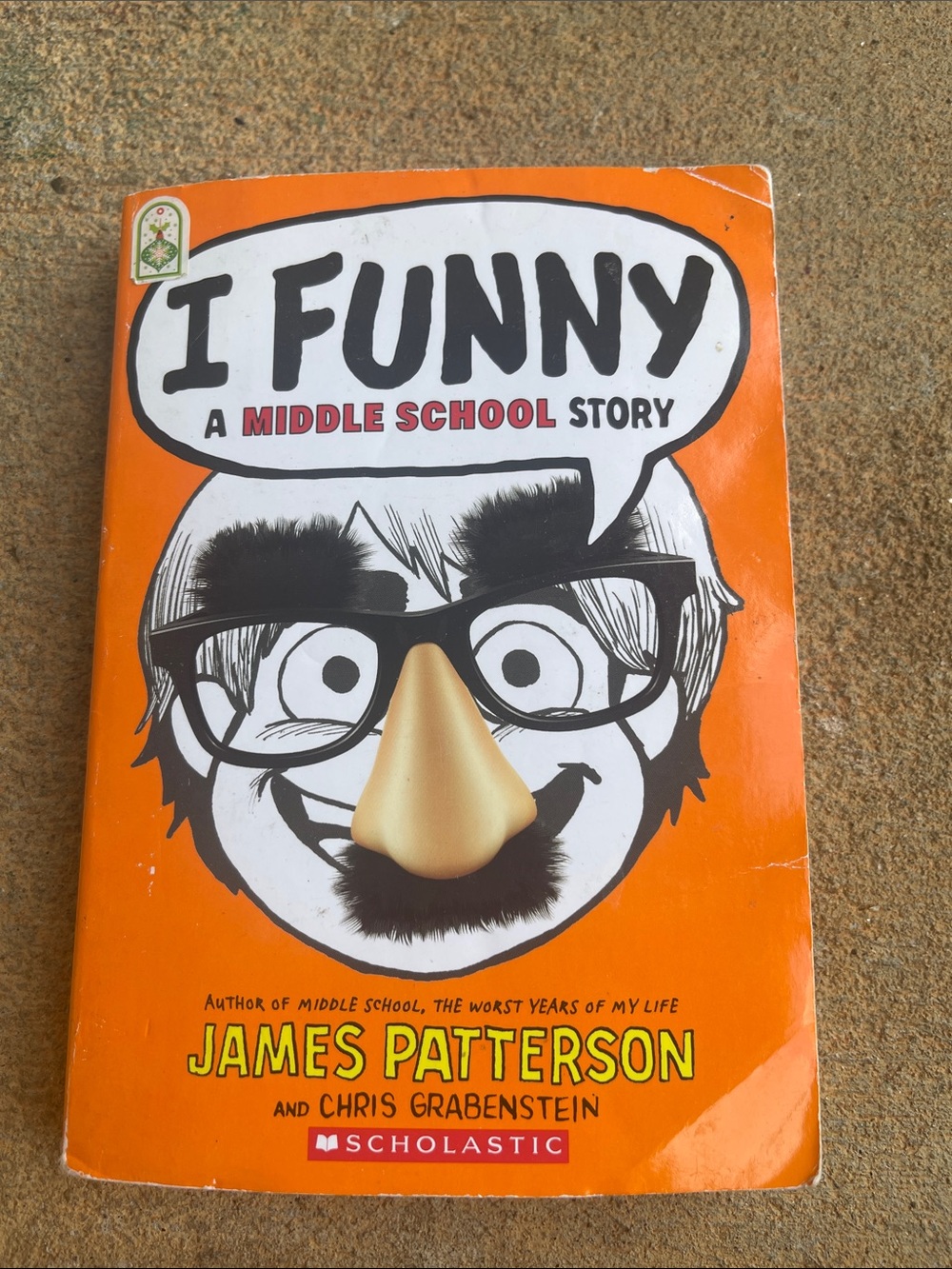 Scholastic Orange Humorous Book Back Cover with Cartoon Characters